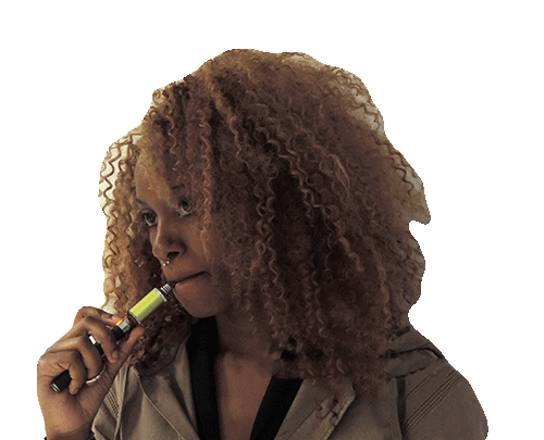 Users of e-cigarettes, such as LeAnna Dailey, 20, photography, may have to give up them up on campus if STLCC enacts a new policy. (Photo illustration by Brandon Reynolds and Scott Allen)