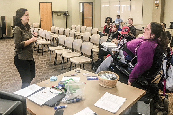 Sexual education specialist Danielle Uding, left, answers a question from Forest Park student Paige Karius at the “Dating with Disabilities” session. (Photo by Destini Clark)