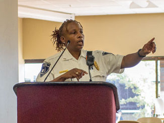Police Lt. Terri Buford speaks Oct. 3 on National Coffee with a Cop Day in the Forest Park cafeteria. ( Photo by Daniel Shular)