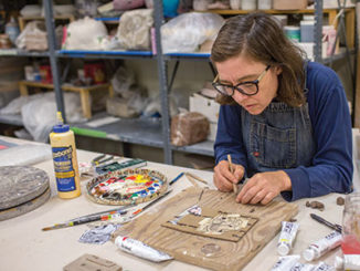 Ceramic artist Kristen Morgin works on a piece on Oct. 25 for a demonstration in the Art Annex. (Photo by Daniel Shular)