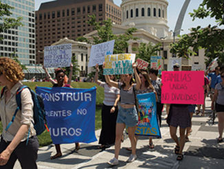 Protesters in a Families Belong Together march through Keiner Plaza in downtown St. Louis on June 14. They were demonstrating against the separation of families at the U.S.-Mexico border. (Photo by Daniel Shular)