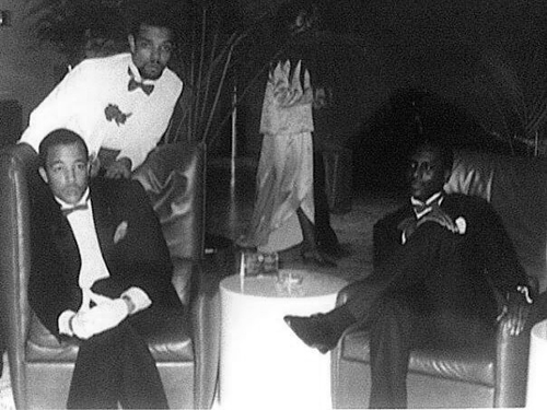 Deejays Thomas “DJ Zilla” Walker, left, and Charles “Beastman” Blackmon, right, relax with friend Julius Jacobs during a dance at the University of North Carolina at Chapel Hill in the early ‘80s. (Provided Photo)