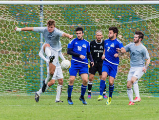 STLCC’s Josh Graham clears the ball out of danger in a regional tournament game last season against Illinois Central College. Graham, a sophomore midfielder, scored 13 goals this season for the Archers. (Photo by Fred Ortlip)