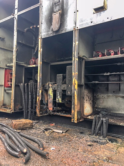 Charred remains of substation equipment. (Photos by Paul Zinck)