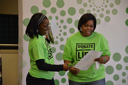 Mother and daughter Angela Johnson and Kandiss Hopkins encourage people to donate organs, in memory of their son and brother, DaVon Steward. (Photo by Scott Allen)