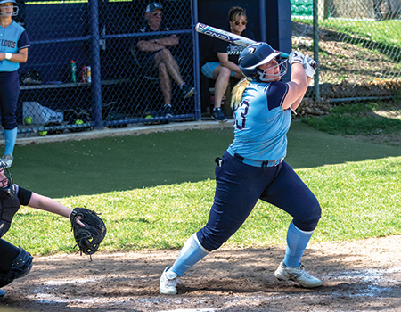 STLCC’s Sidney Litviak watches her opposite-field double that accounted for three runs in the first inning April 22 en route to the Archers’ 17-0 victory over the Central Methodist University JV team. (Photo by Fred Ortlip)