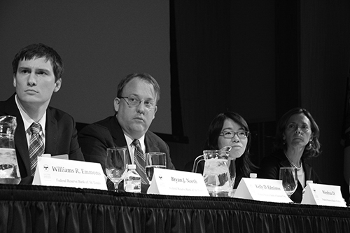 William Emmons, left to right, Bryan Noeth, Kelly Edmiston and Wenhua Di participate in a panel discussion at the syposium. (Photo by Julian Hadley)