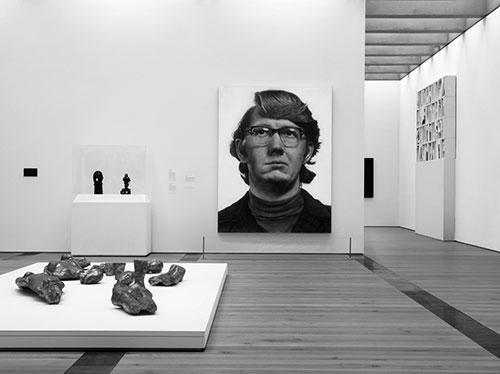 “Keith” by Chuck Close hangs in a gallery in the new East Building. (Photo by Alise O’Brien, courtesy of the St. Louis Art Museum)
