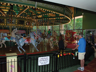 The old Highlands carousel is still in use at Faust Park in Chesterfield; people pay $2 a ride or $5 for three rides. (Photo by Justin Tolliver)
