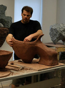 John Zimmerman builds a clay sculpture. (Provided photo)