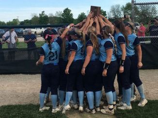 Members of the STLCC softball team celebrate the District P championship after defeating Lewis and Clark two games to none. The victory earned the Lady Archers a berth in the NJCAA national tournament. (Provided photo)