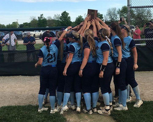 Members of the STLCC softball team celebrate the District P championship after defeating Lewis and Clark two games to none. The victory earned the Lady Archers a berth in the NJCAA national tournament.  (Provided photo)