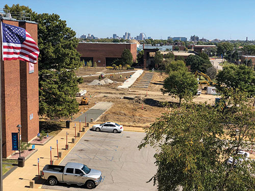 A photo taken from a window on the fourth floor of E Tower on Sept. 30 gives a bird’s-eye view of construction on Forest Park’s new quad, which will include walkways, landscaping, seating and two sculptures. (Fred Ortlip)