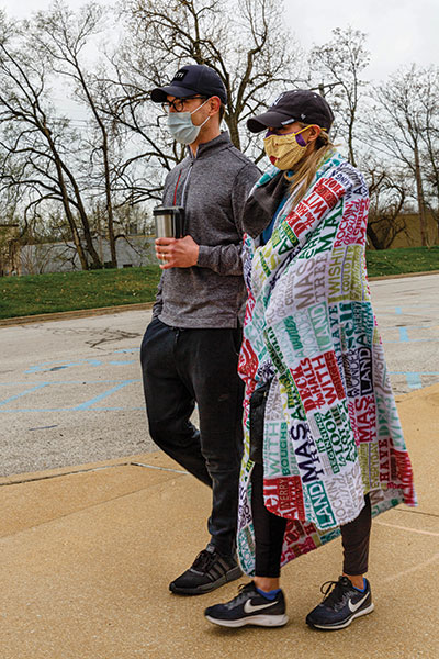 Lauren Murphy, right, and Kyle Murphy waited nearly two hours on a chilly morning. (Photo by Fred Ortlip)