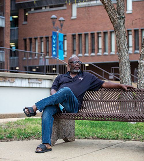 STLCC student and inventor Marvin Thomas sits on the Forest Park campus. (Photo by Fred Ortlip)