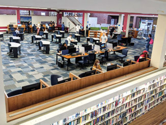 The Forest Park library is busy again with the return of most students to campus after the COVID-19 shutdown and gradual reopening. (Photo by Andrew Quinn)